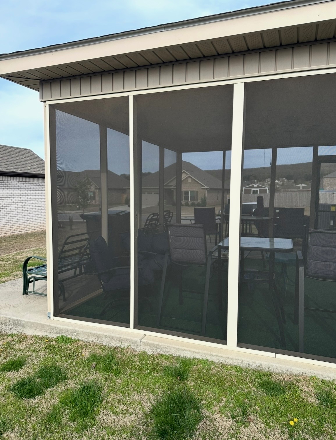Screened-in back porch