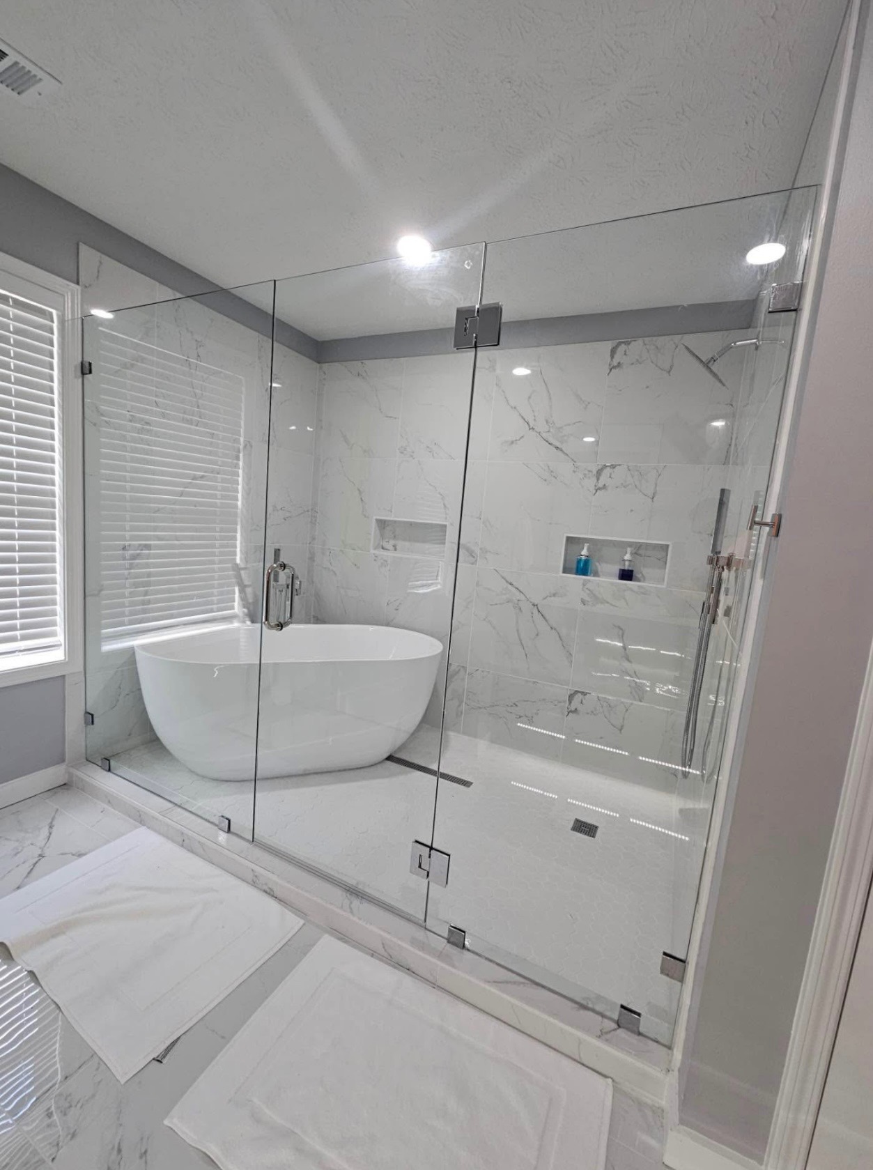 Marble wet room with freestanding tub