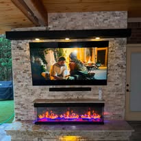Outdoor fireplace & TV wall