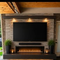 Stone fireplace feature wall with lighting