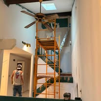 Two-story stairwell paint project