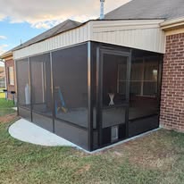 Screened porch build with concrete pad